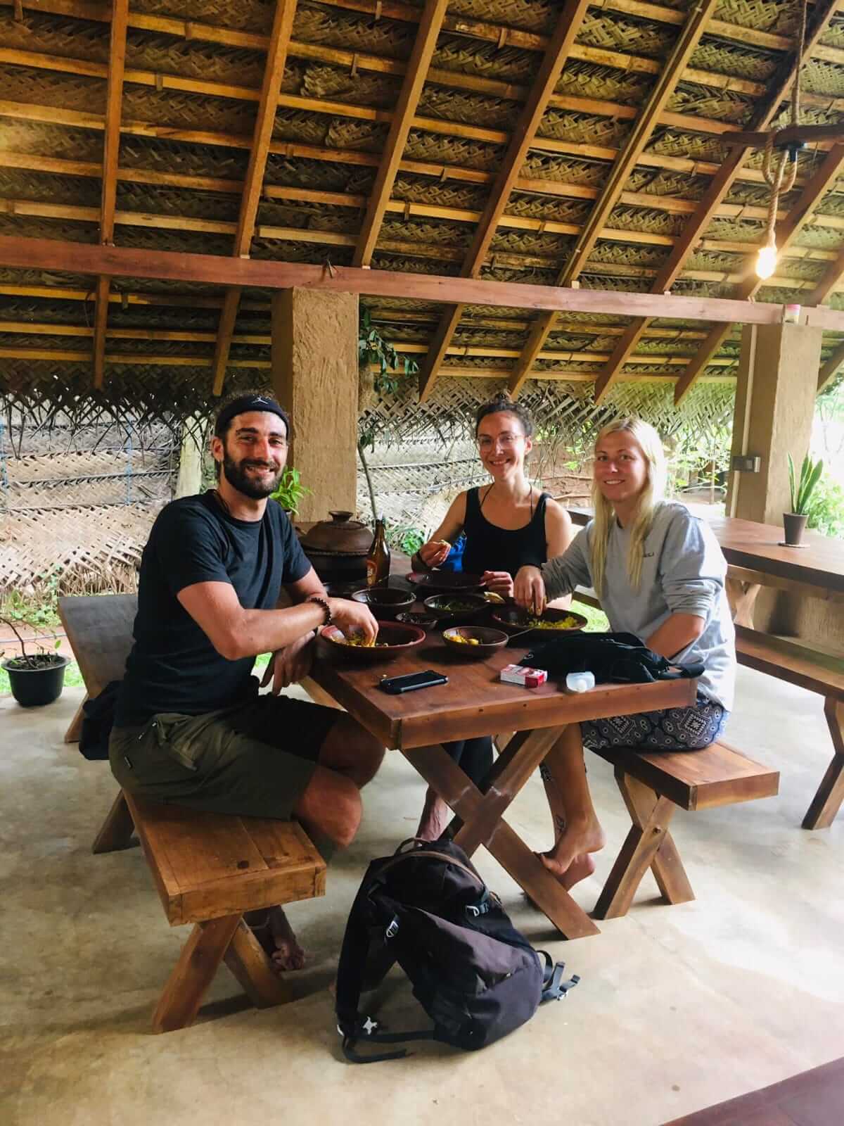 MD Tours guests sharing a Sri Lankan meal